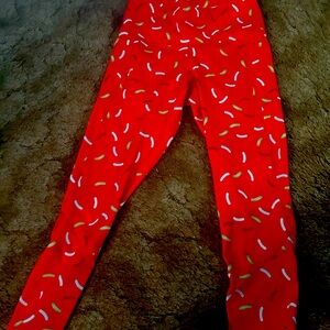 Feed me fight me red sprinkle leggings.
